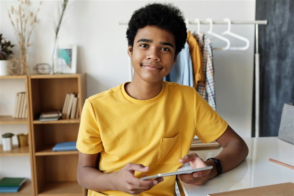 Teenager with iPad